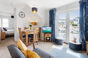 A modern and cosy apartment just yards from Brixham’s bustling harbourside